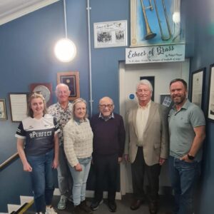 Mullingar Town Band committee members being presented with the trombone